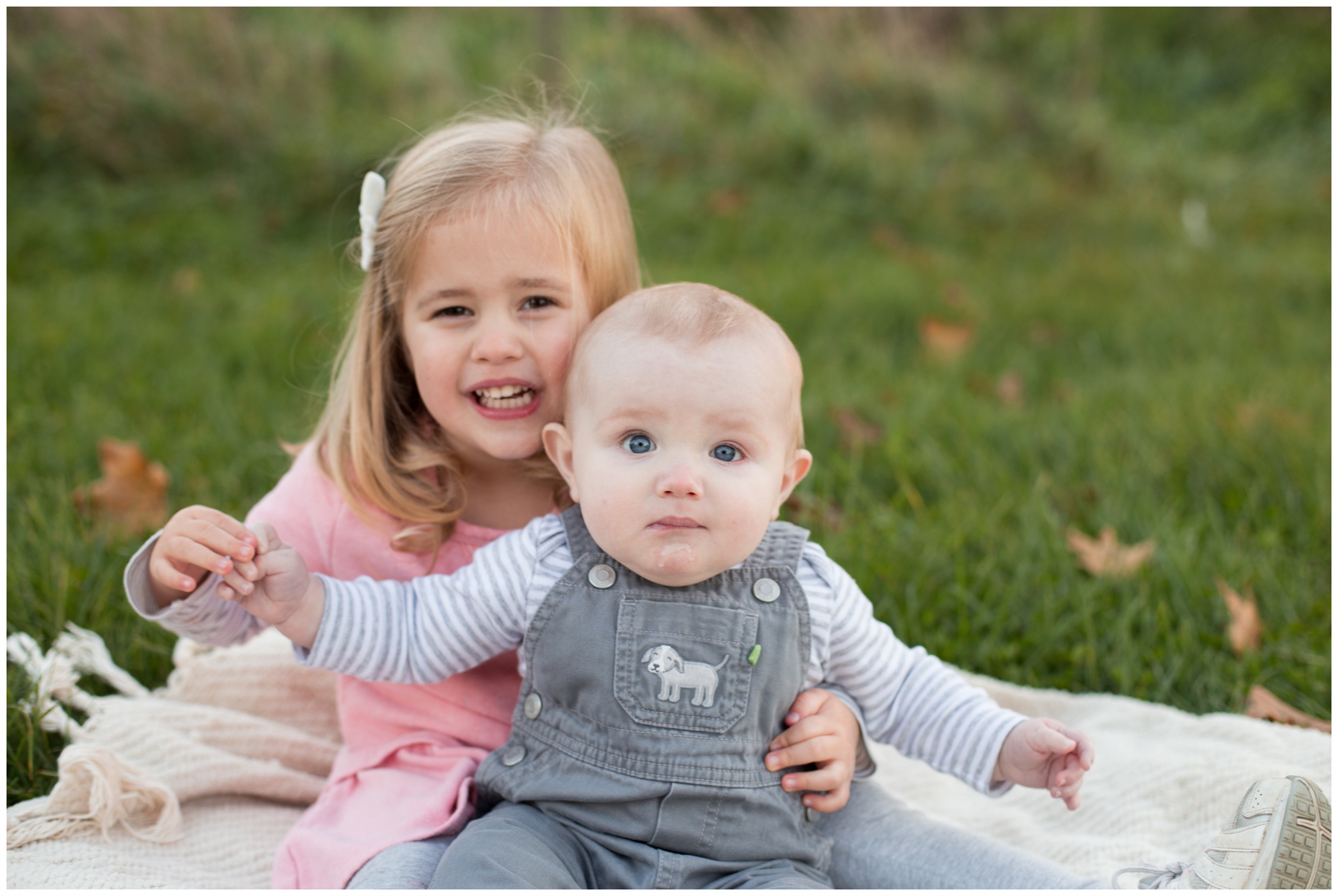 young sister and brother during family session in Kokomo, Indiana