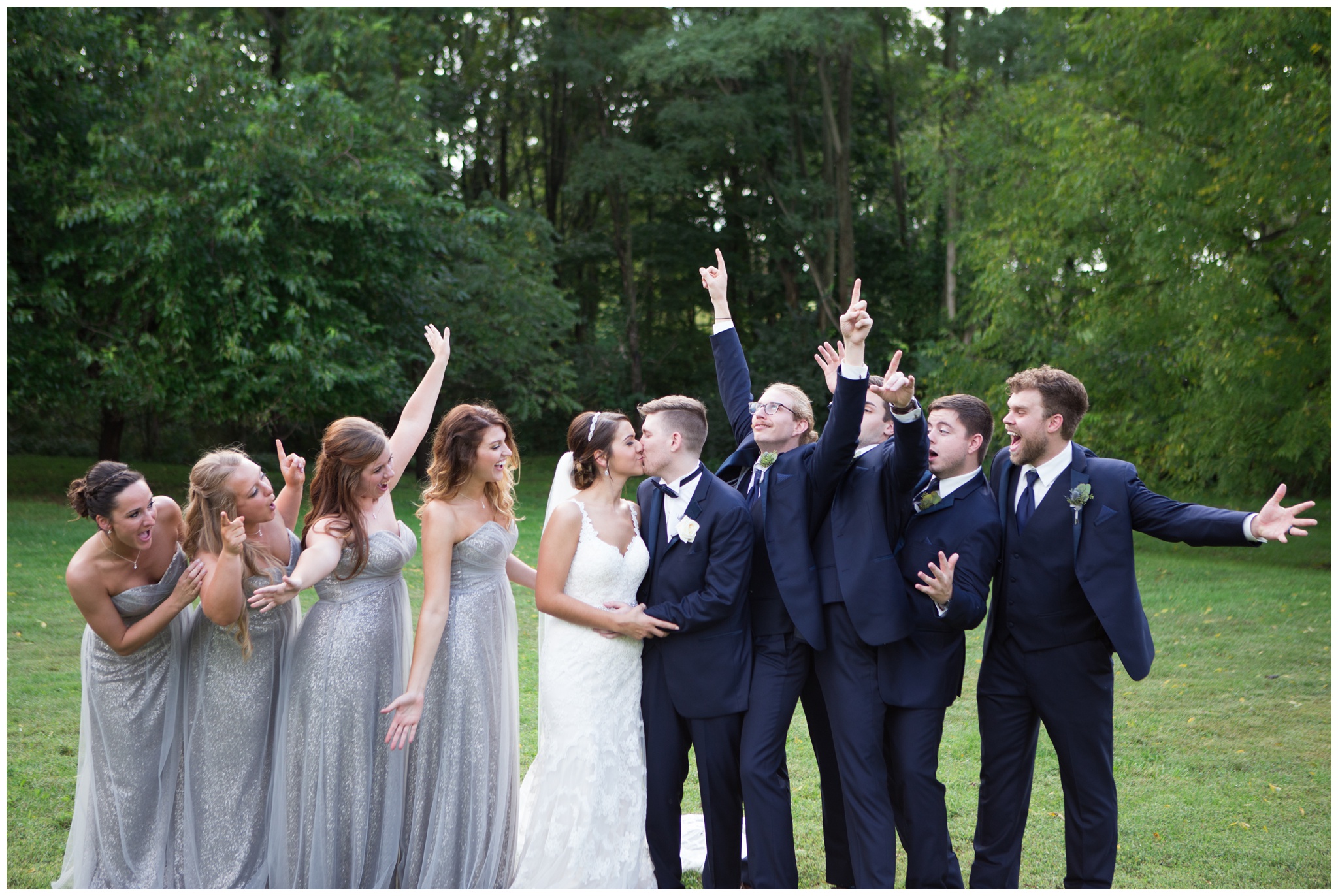 bridal party cheering for bride and groom at the Lodge at River Valley Farm in Yorktown Indiana
