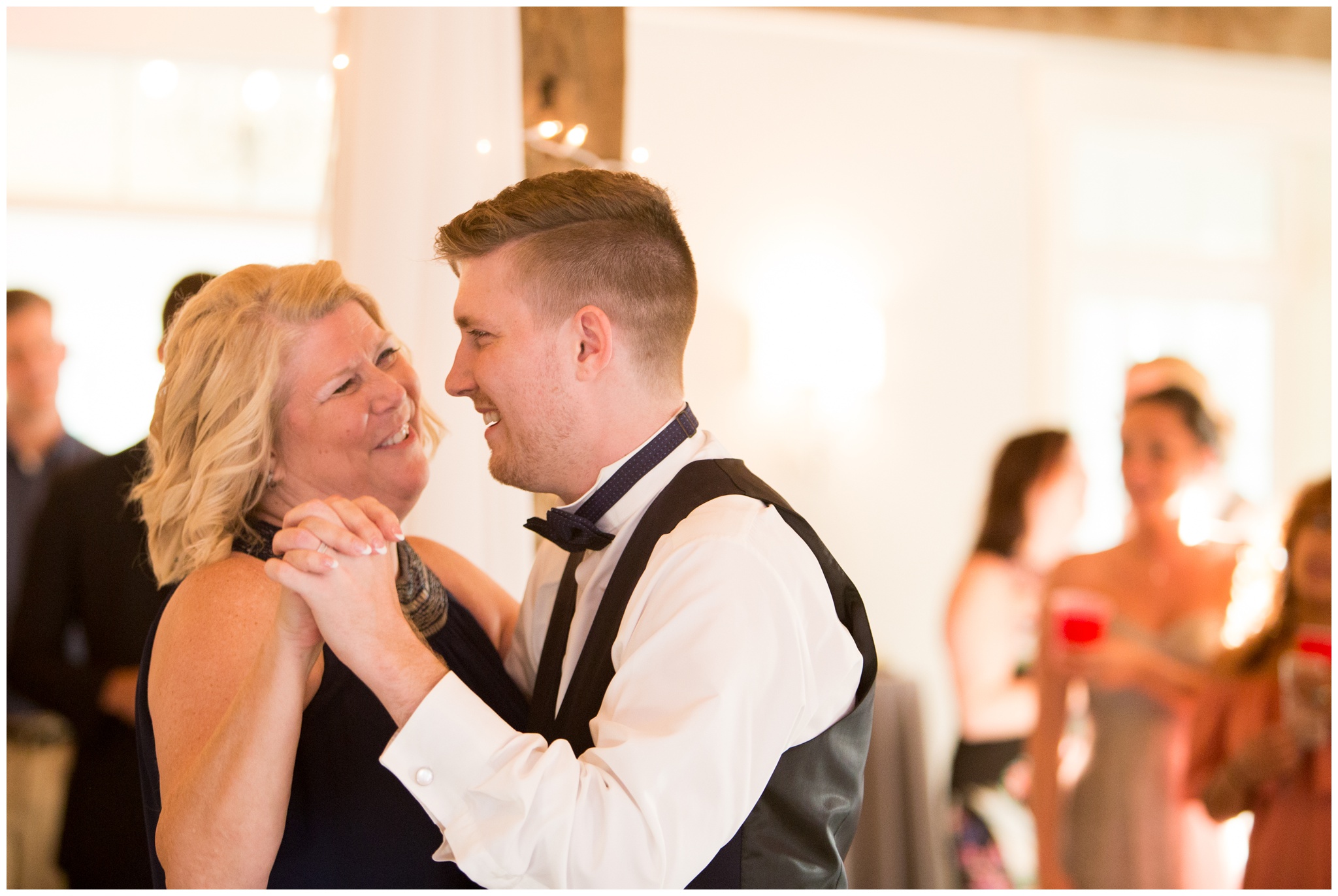 mother-son dance during reception at the Lodge at River Valley Farm in Yorktown Indiana