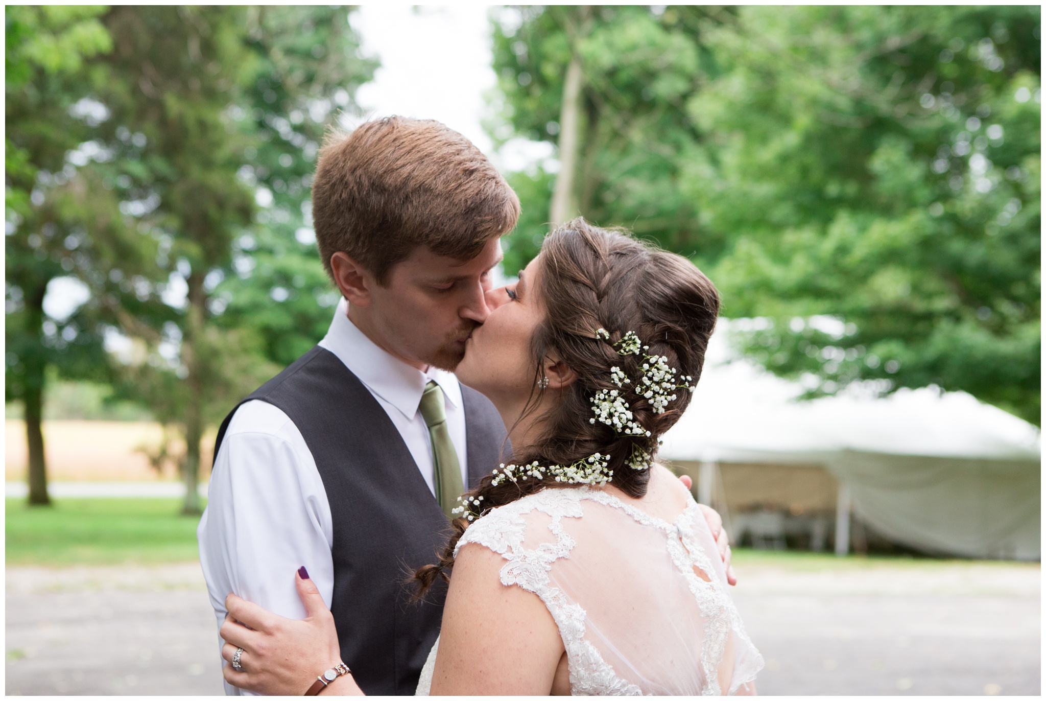 bride and groom kiss after ceremony at Historic Meeting House at New Garden in Fountain City Indiana