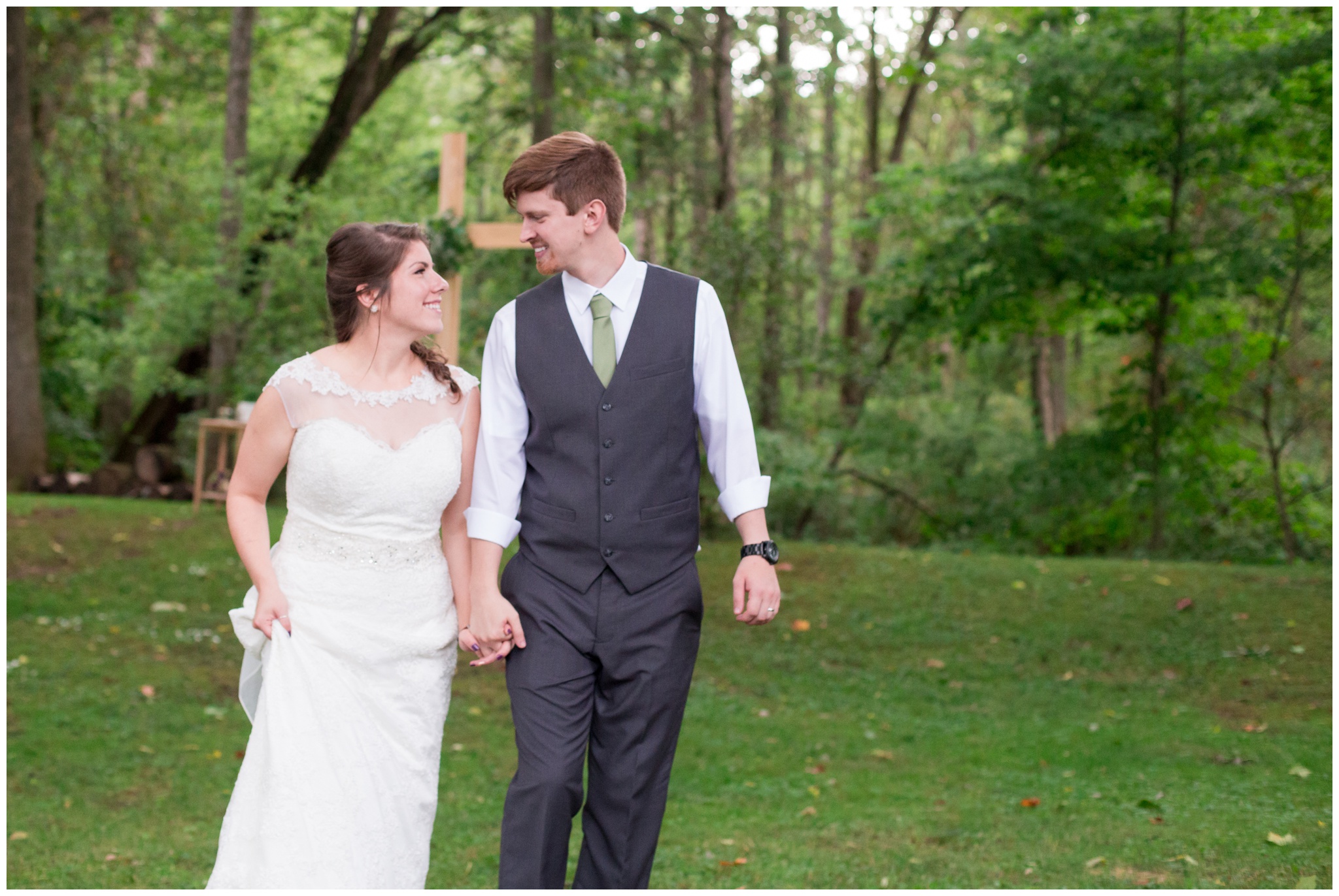 bride and groom walking at Historic Meeting House at New Garden in Fountain City Indiana