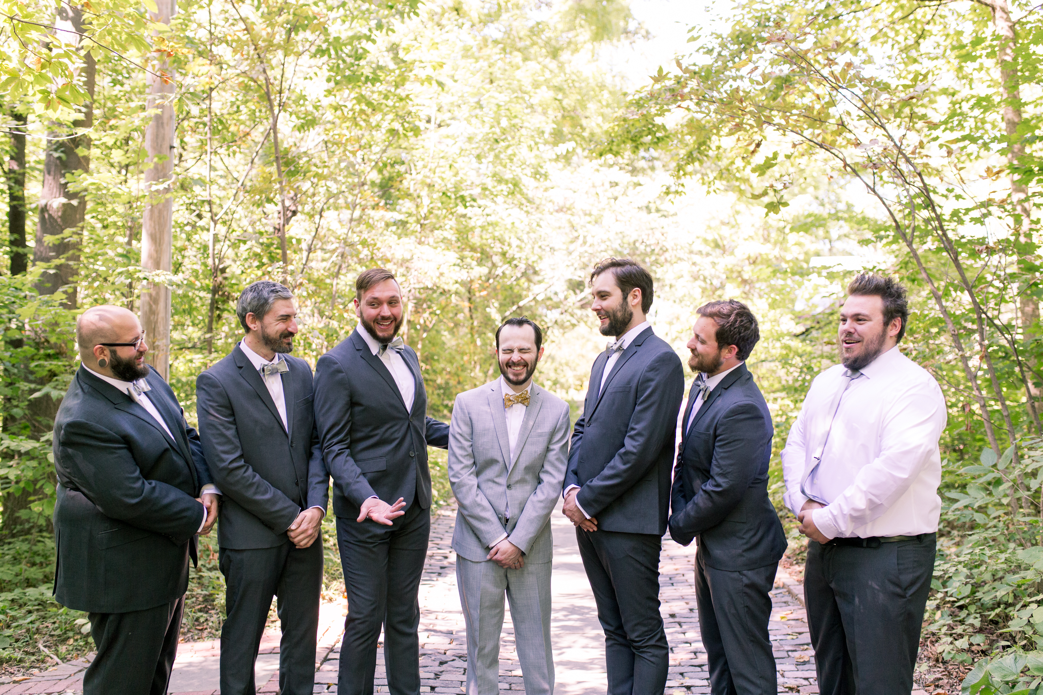 groomsmen and groom portraits before wedding at Minnetrista Cultural Center in Muncie Indiana
