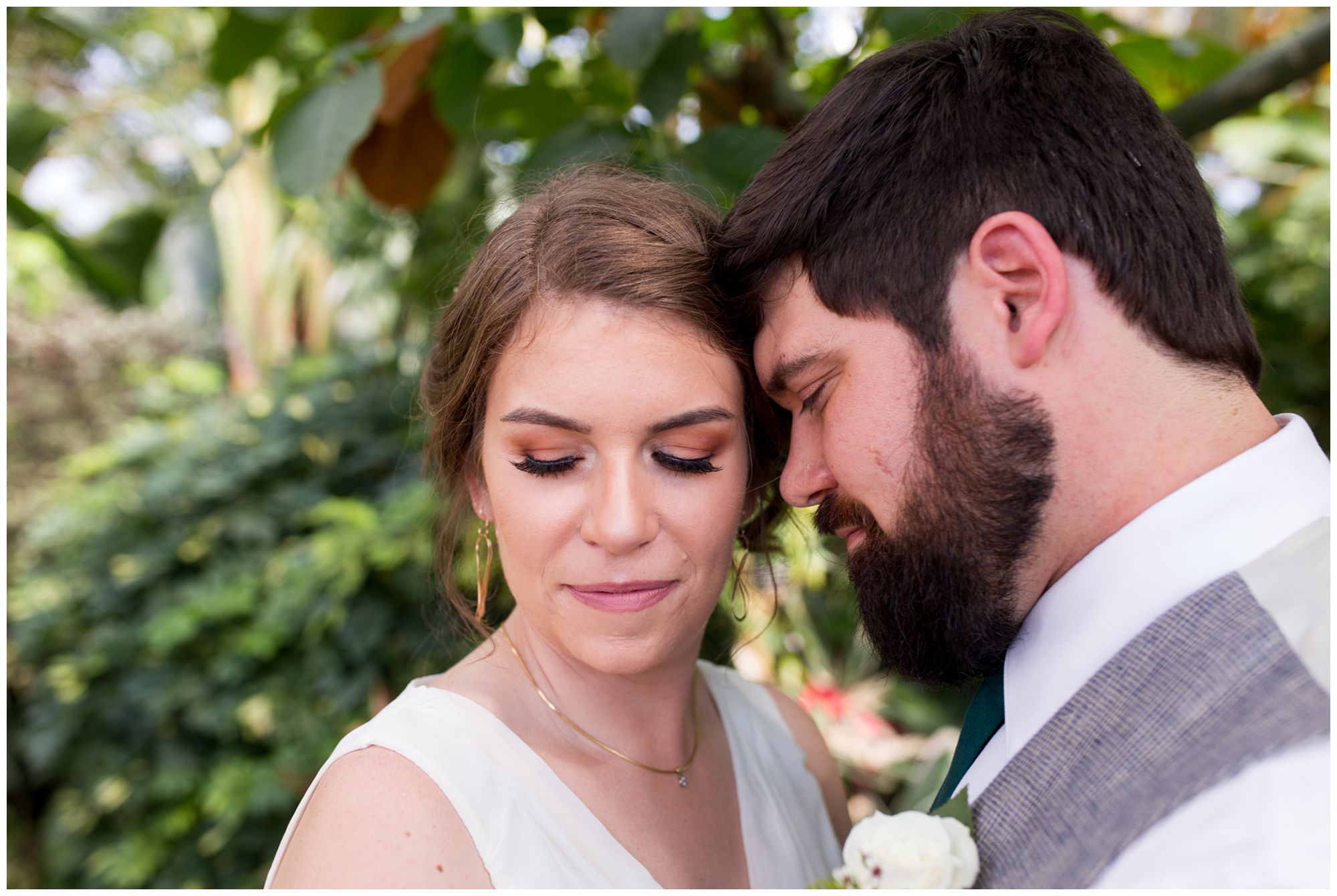 bride and groom portraits in Garfield Park Conservatory Indianapolis elopement