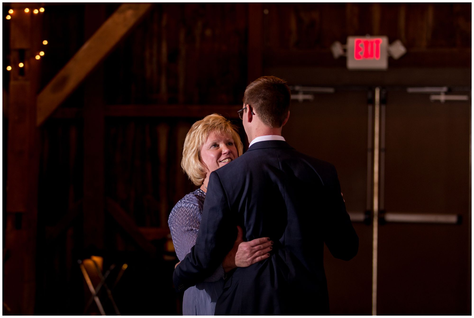 groom and mother dance during wedding reception at Mustard Seed Gardens in Noblesville Indiana