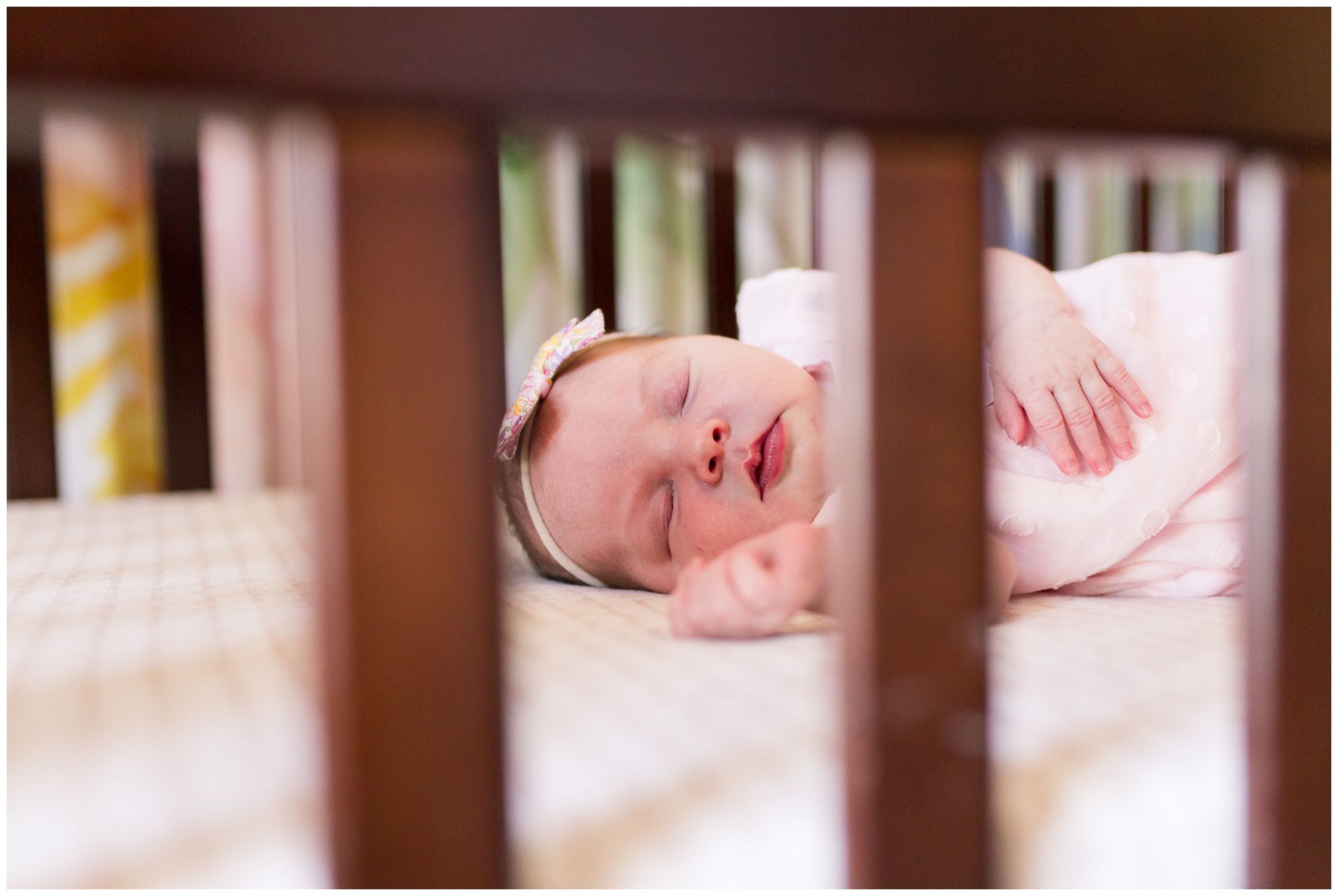 newborn sleeping in crib during newborn session in Westfield, Indiana