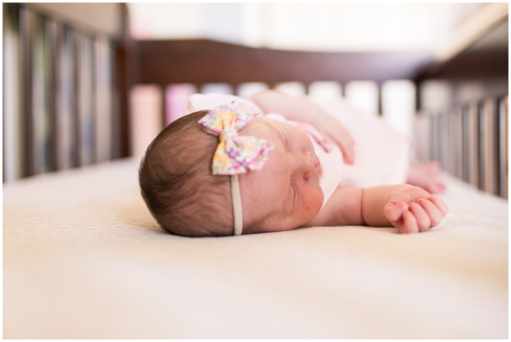 newborn photographed from head angle in crib during Westfield Indiana newborn session