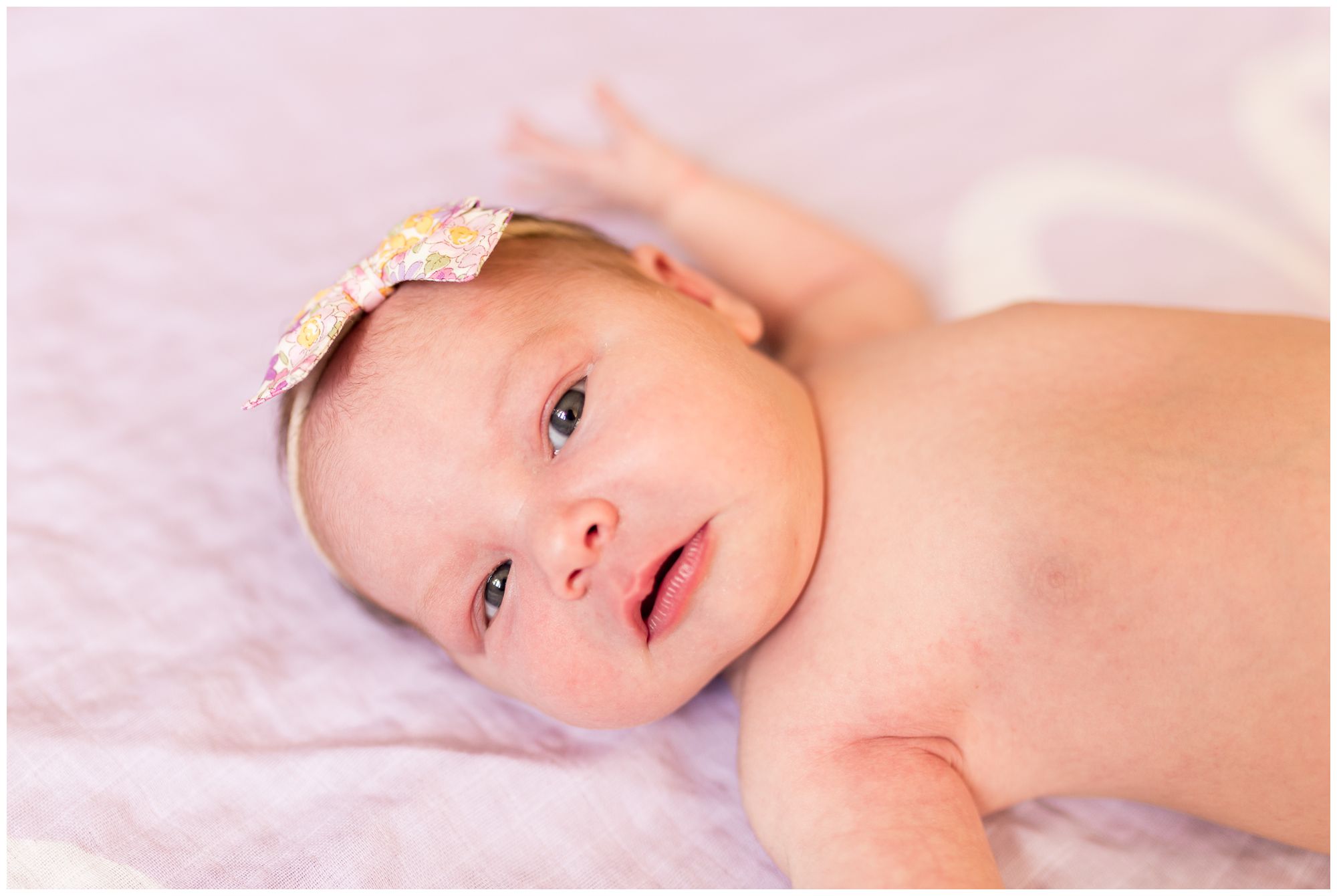 Westfield newborn photographer captures newborn with open eyes