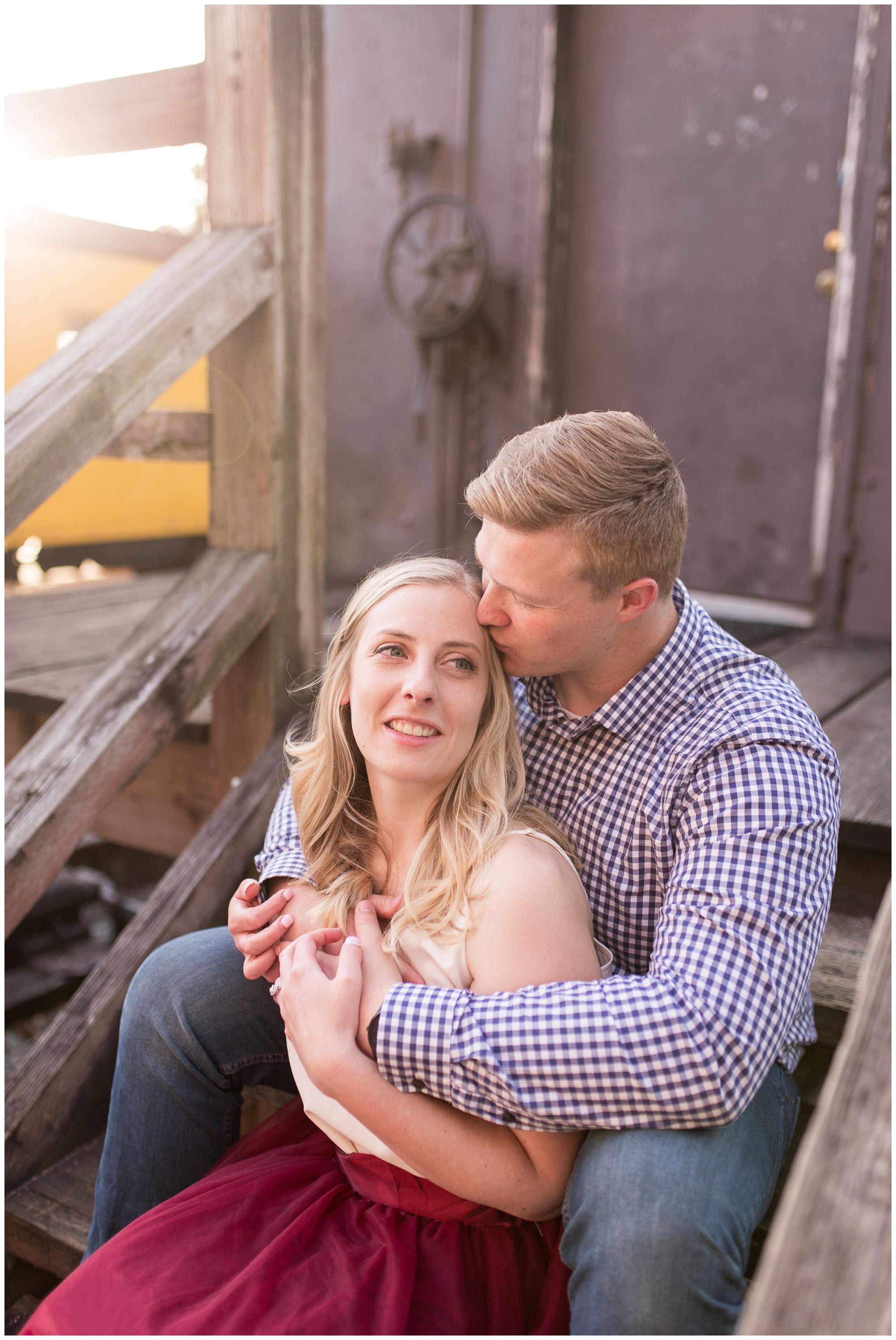 groom kisses bride's head during engagement session at Issaquah Depot Museum // Autumn Howell Photography