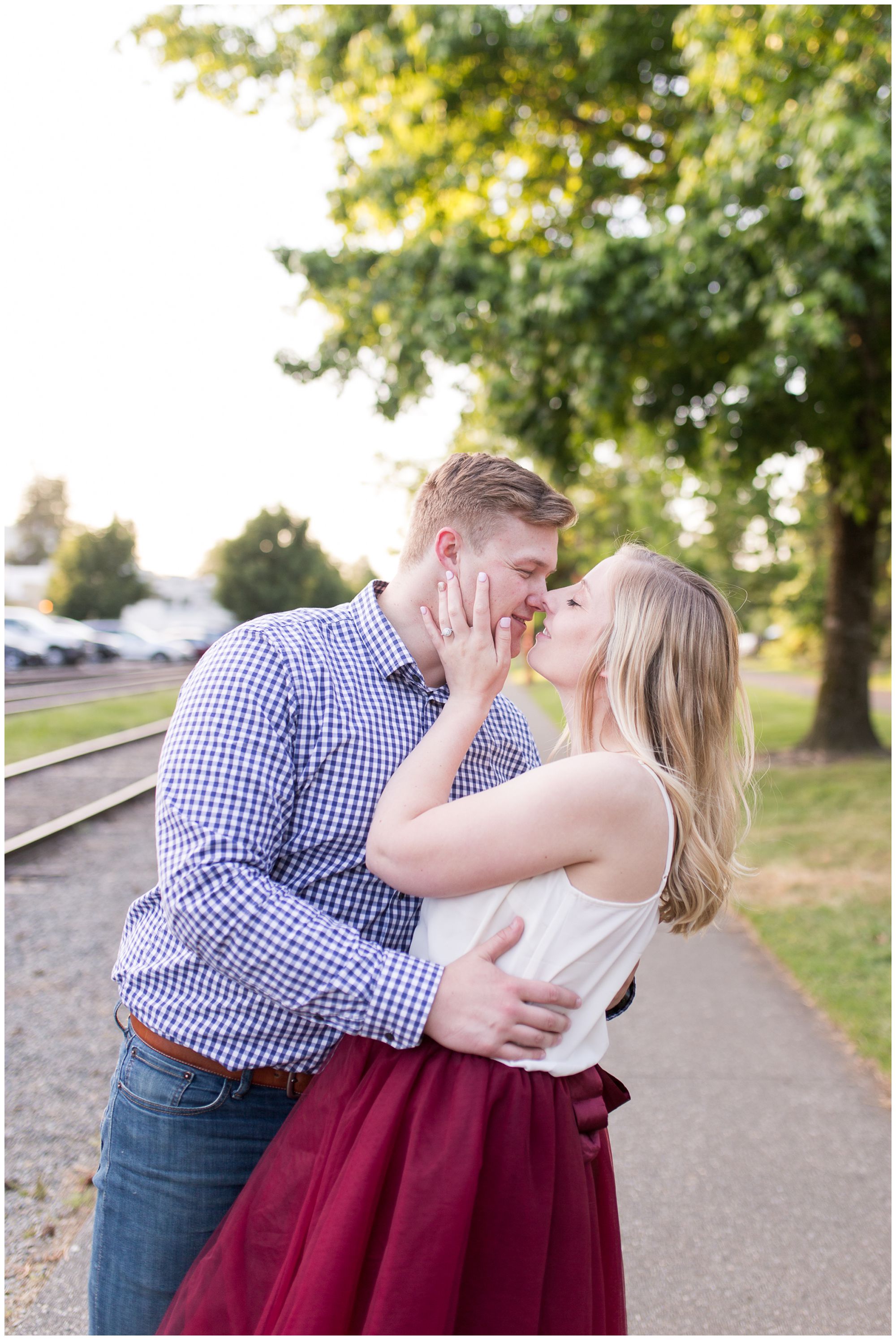 groom dips bride during Issaquah engagement session at Issaquah Depot Museum // Autumn Howell Photography
