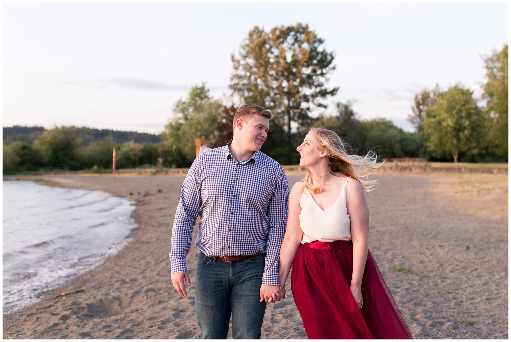 couple walks holding hands at Lake Sammamish State Park engagement session // Autumn Howell Photography