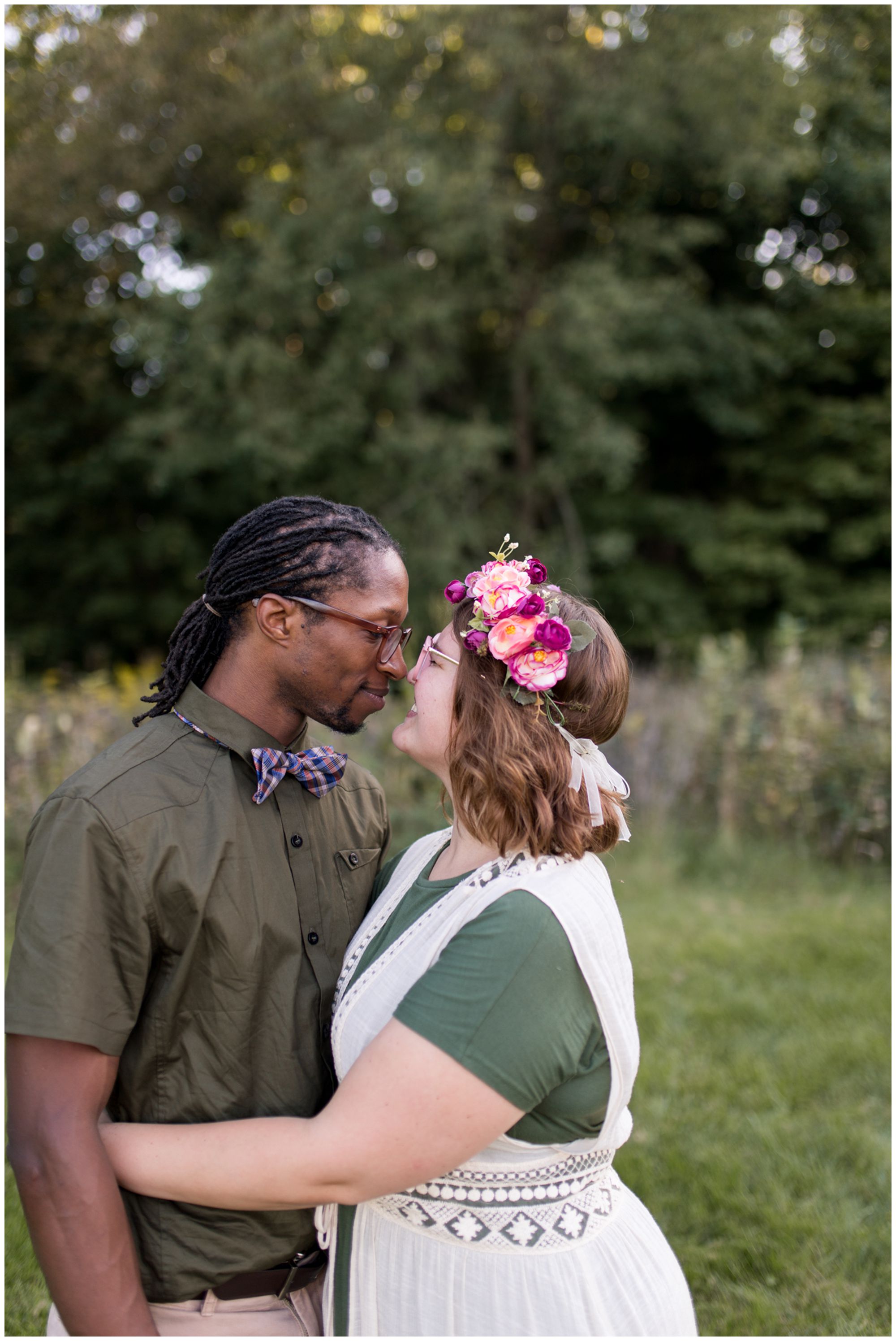 husband and wife with noses together at Jackson Morrow Park during Kokomo family session