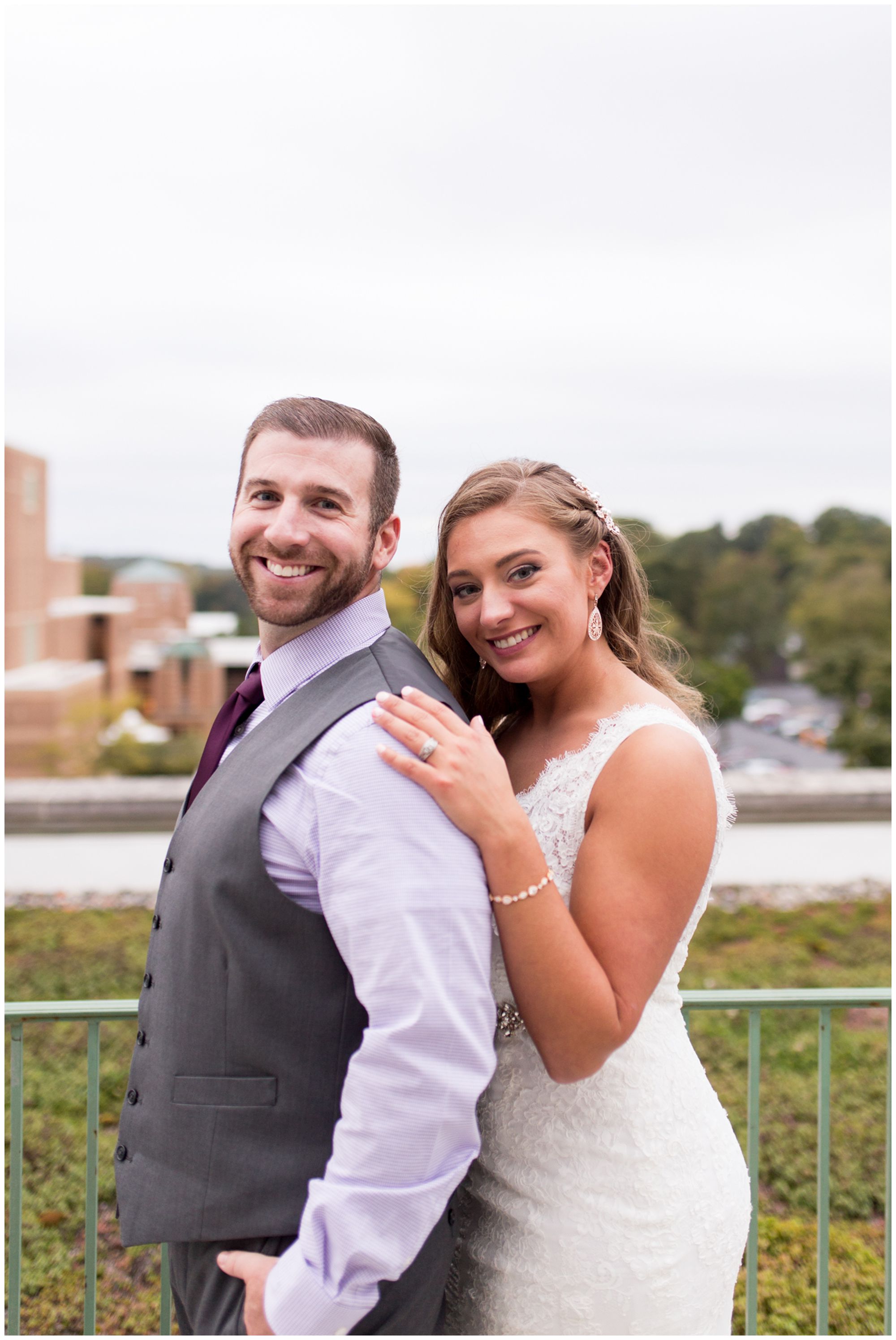 bride and groom portraits on Charley Creek Inn rooftop in downtown Wabash Indiana