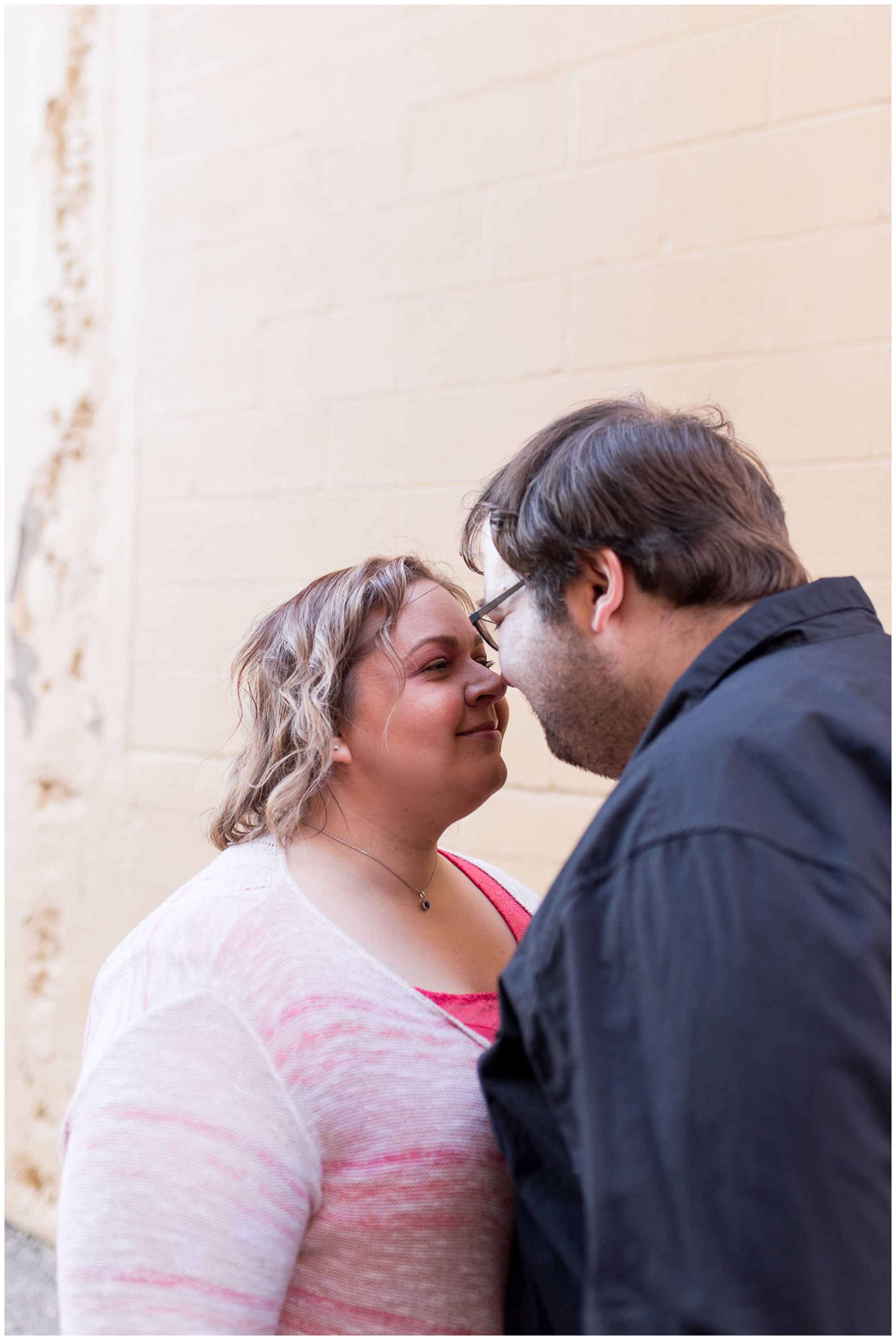 bride and groom nose to nose during engagement session in Kokomo Indiana