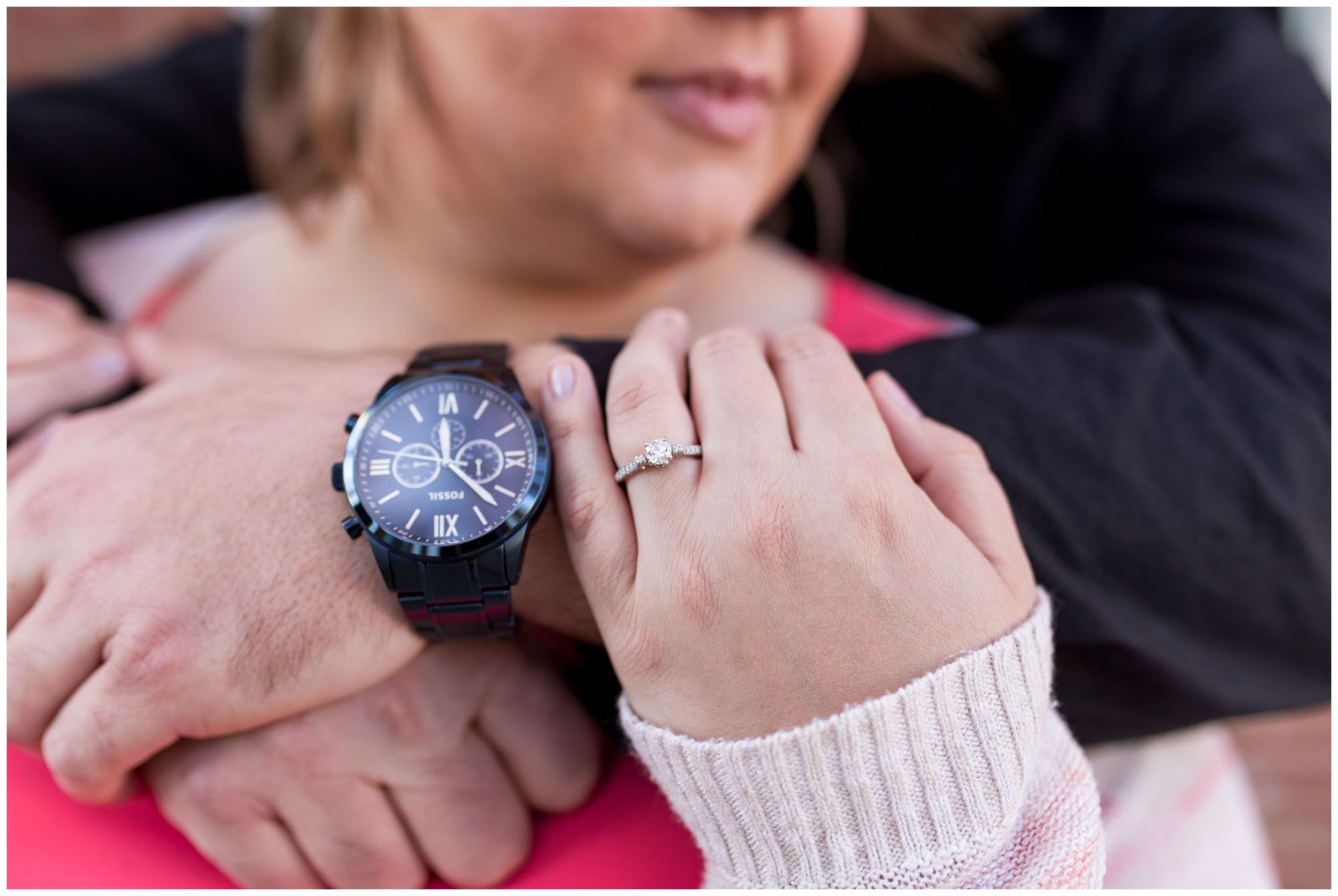 close up of bride's engagement ring with groom's watch during Kokomo Indiana engagement session
