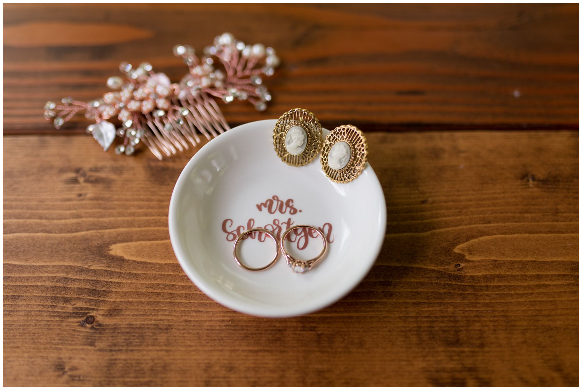 bride's earrings and wedding rings in name dish before Muncie Indiana wedding