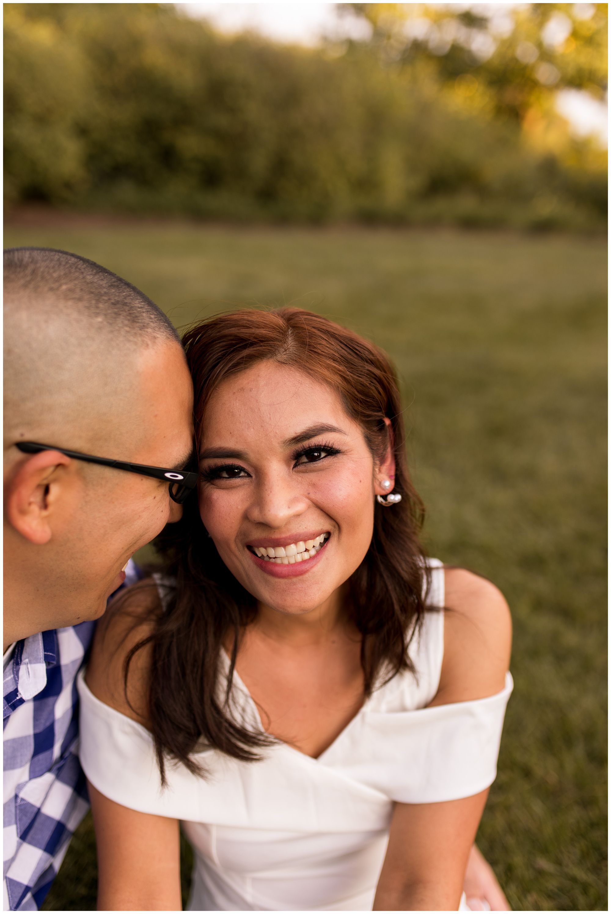 bride laughs during engagement session at Headwaters Park
