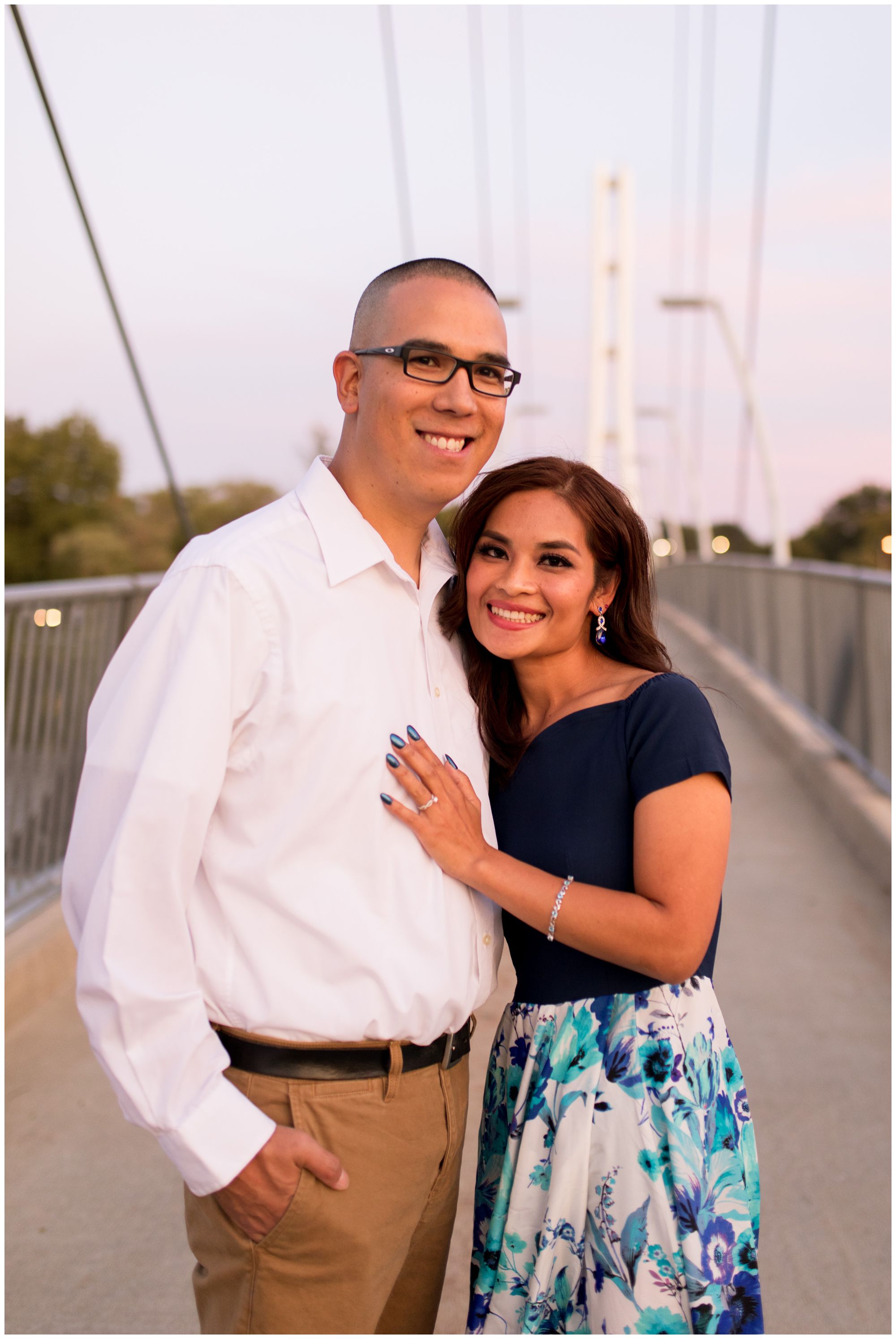 couple engagement session on Parker Cole Pedestrian Bridge in Fort Wayne Indiana