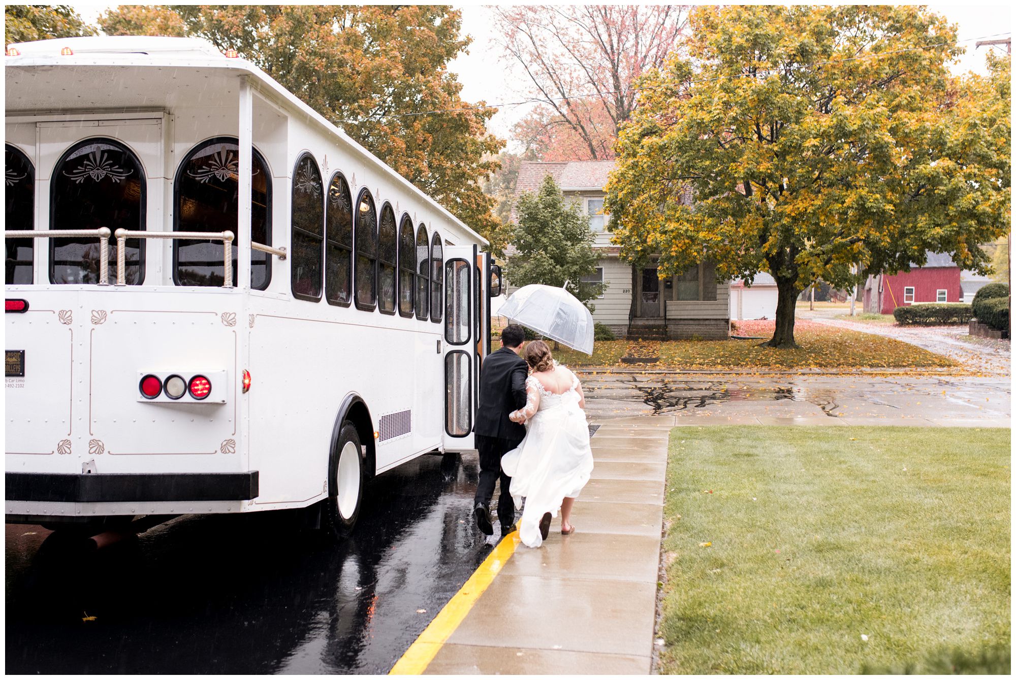 bride and groom board trolley for Fort Wayne wedding reception