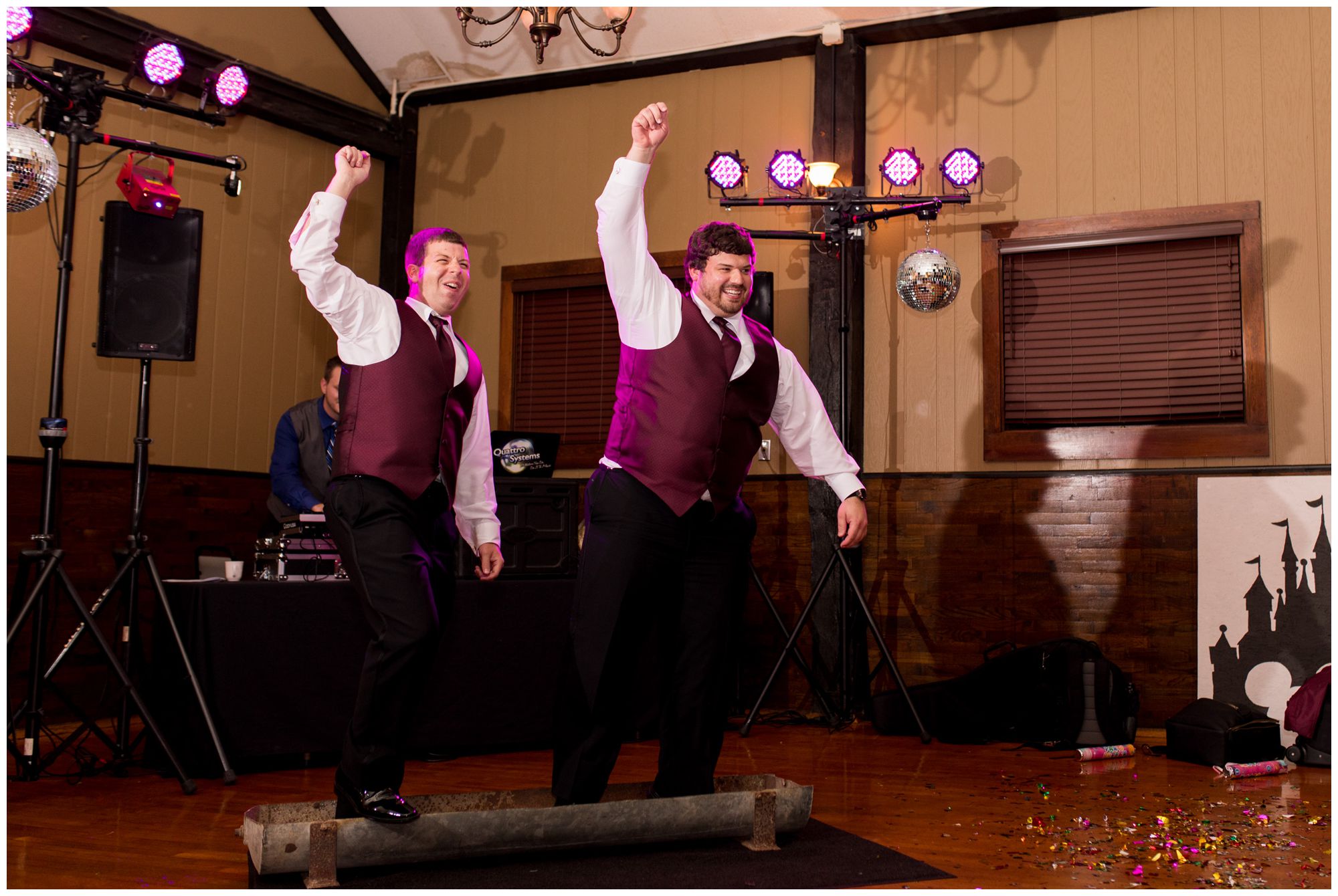 groom's brothers do hog trough dance during Fort Wayne wedding reception