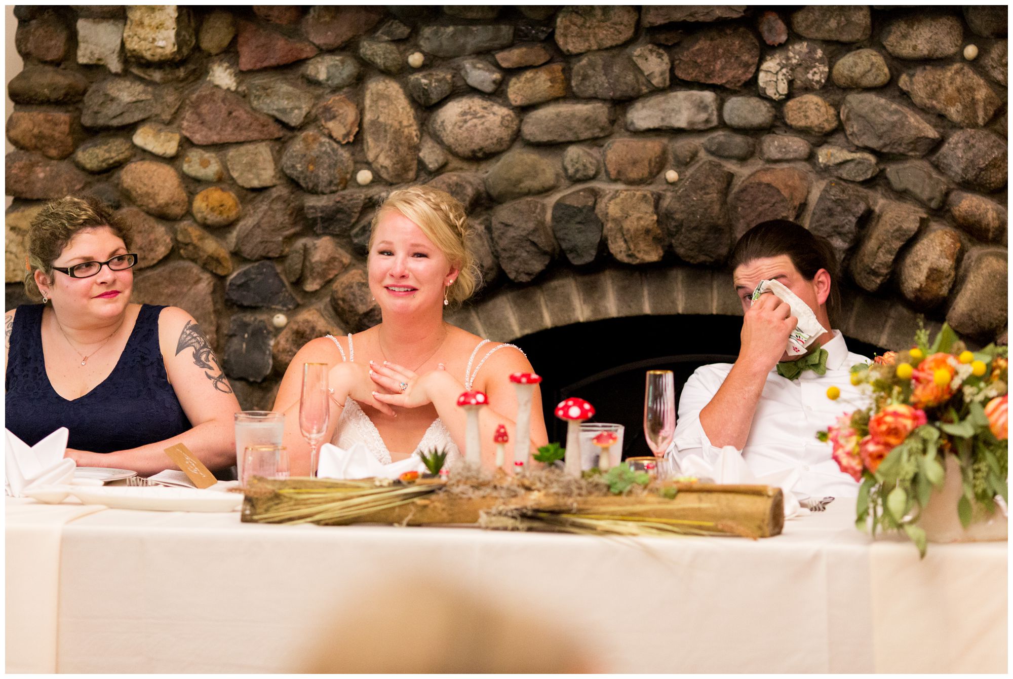 bride and groom crying during father's speech at Forest Park Inn reception