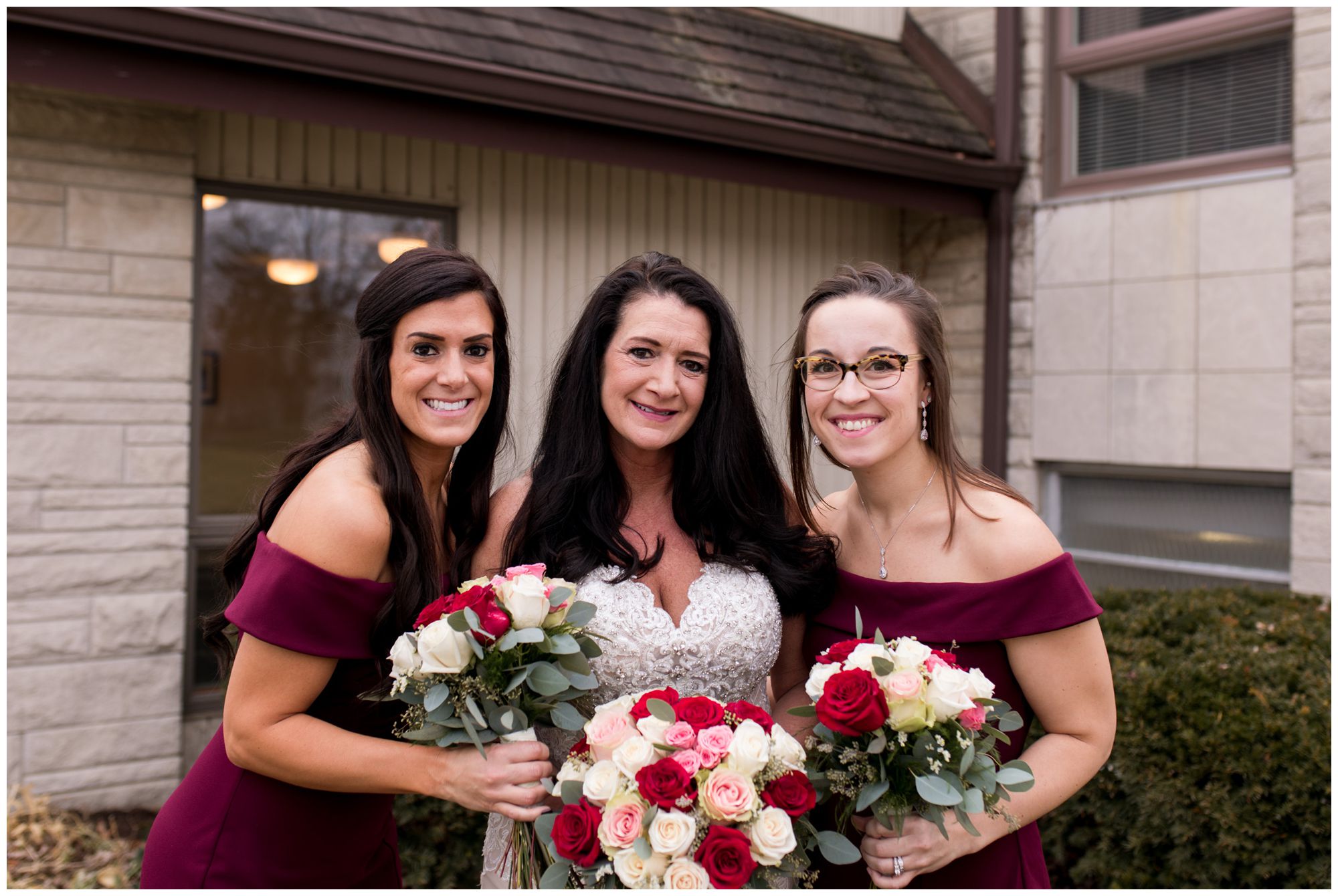 bride with bridesmaids before winter Portland Golf Club wedding in Portland Indiana