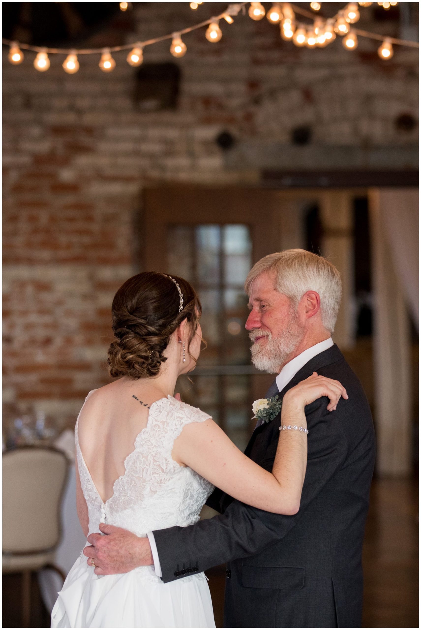 bride and father of bride dance during Goshen Indiana wedding reception