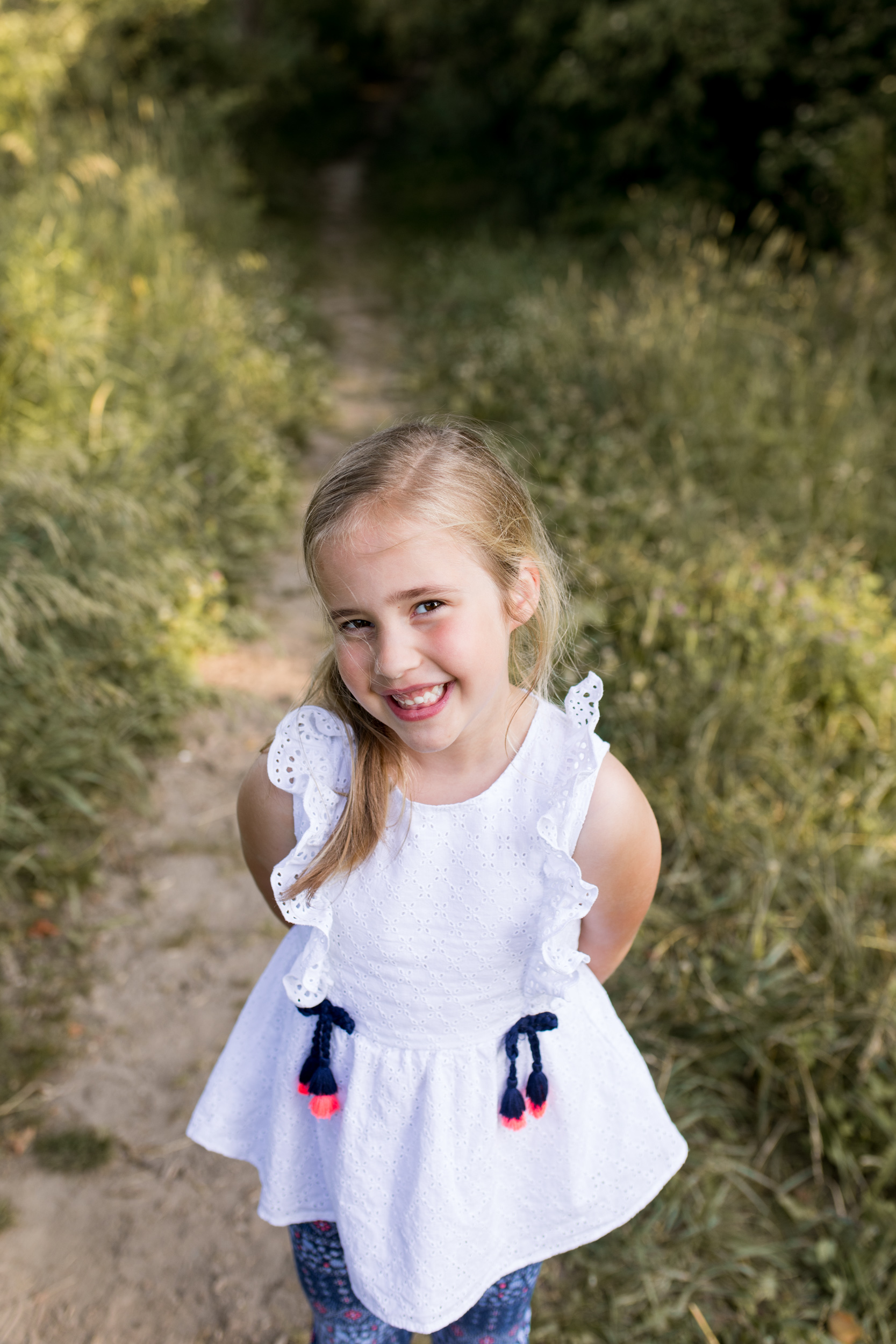young girl poses for photo during Kokomo Indiana family session