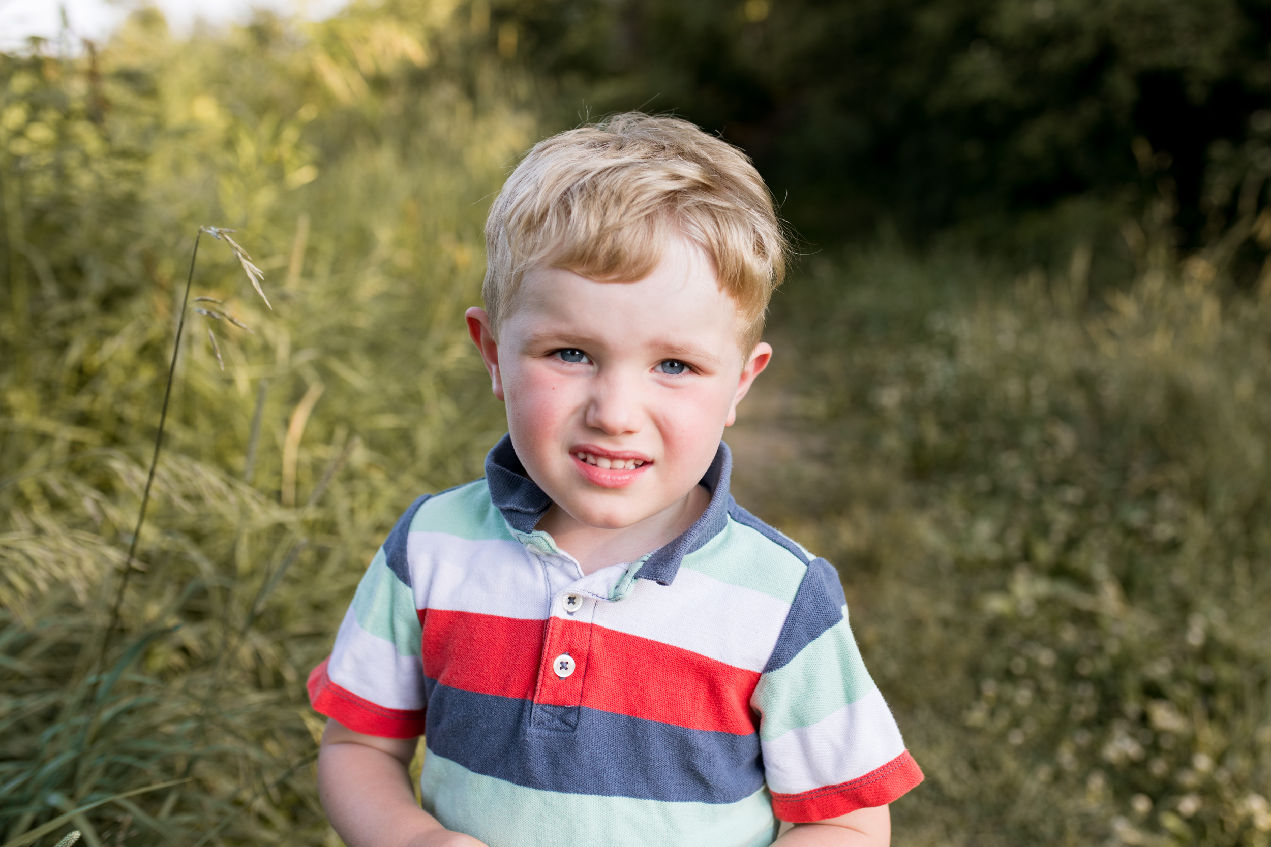 young boy poses for photo during Kokomo Indiana family session
