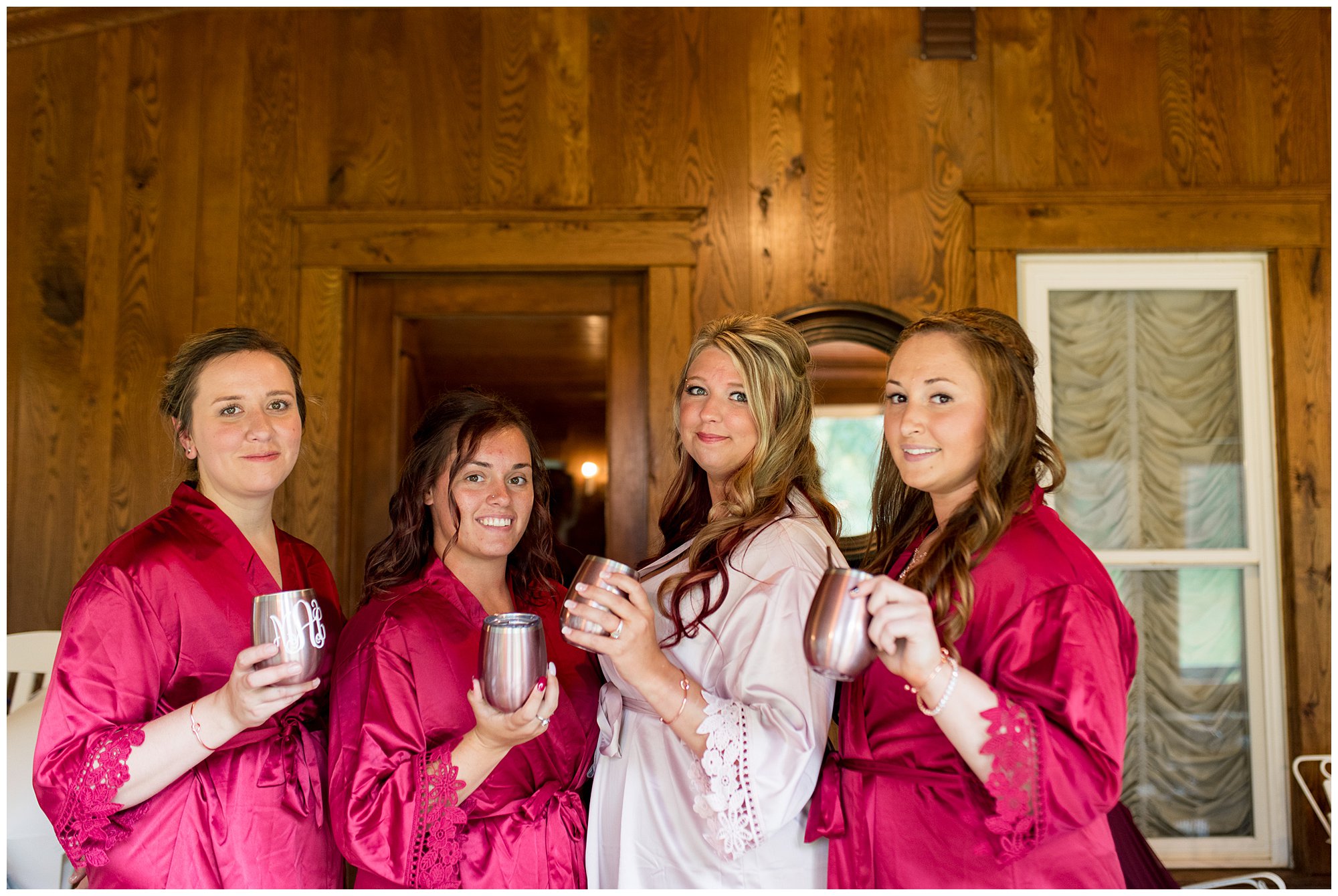 bride and bridesmaids in robes getting ready at The Old Mill Village