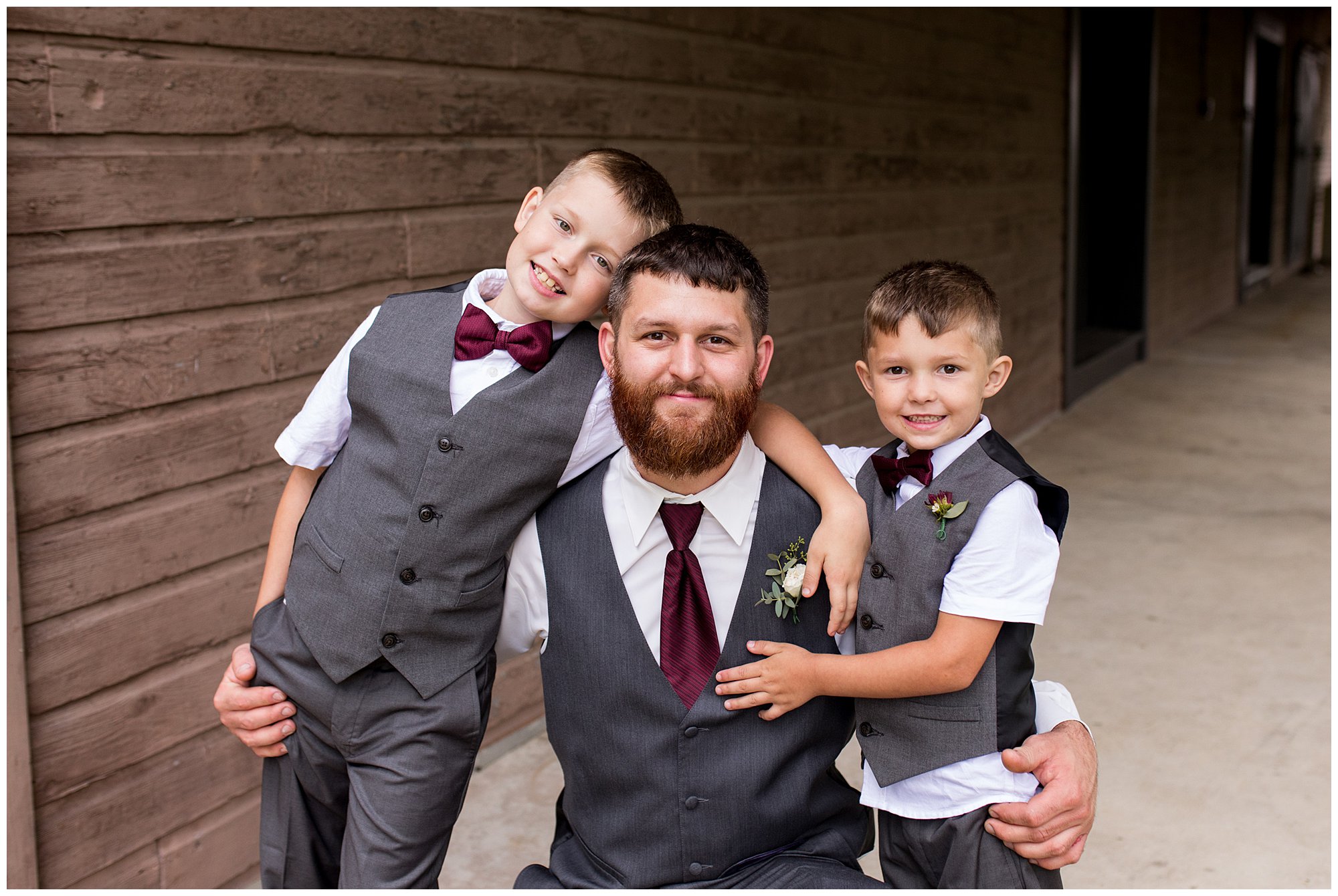 groom with sons before The Old Mill Village wedding