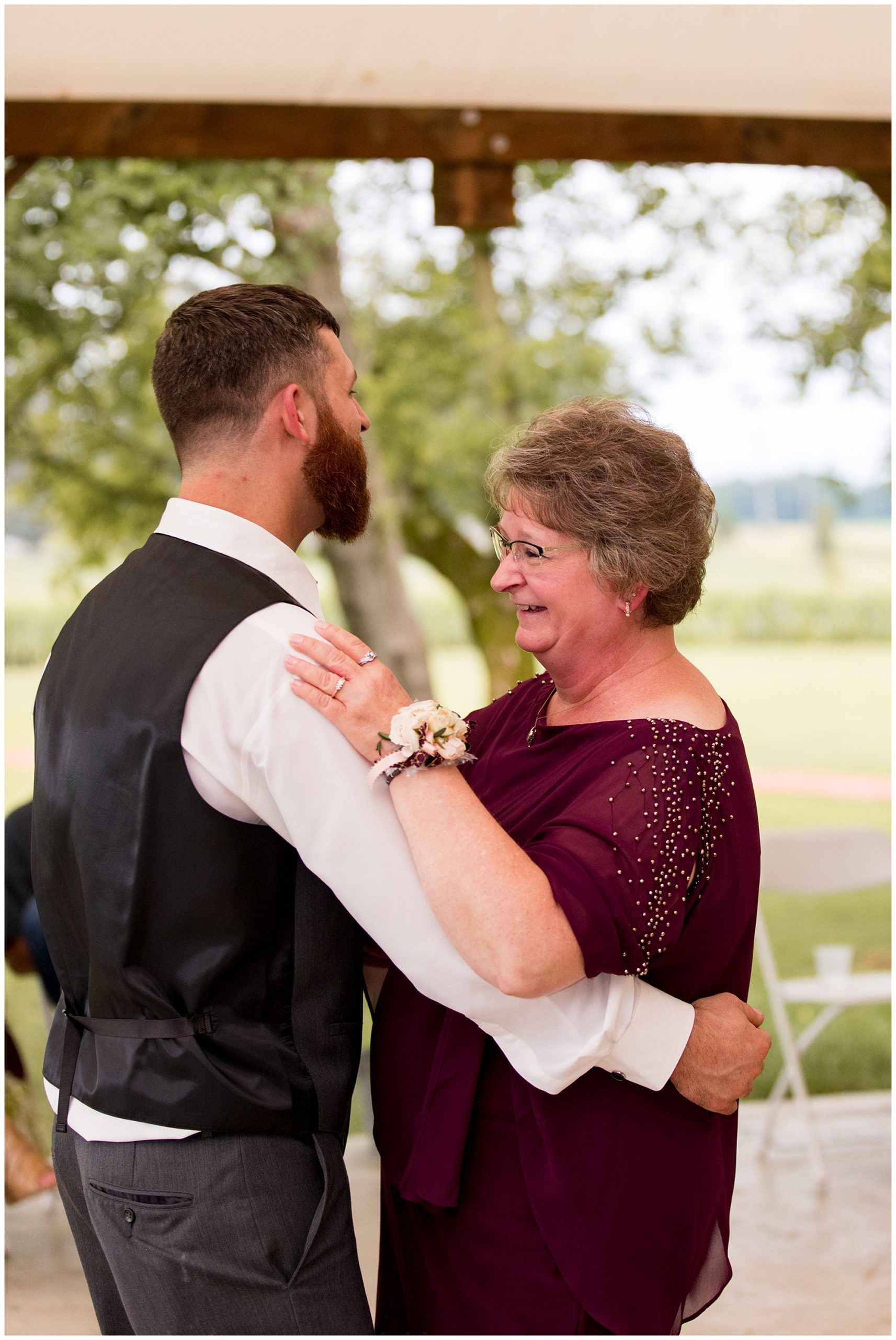 groom dances with mom at The Old Mill Vilage WEdding