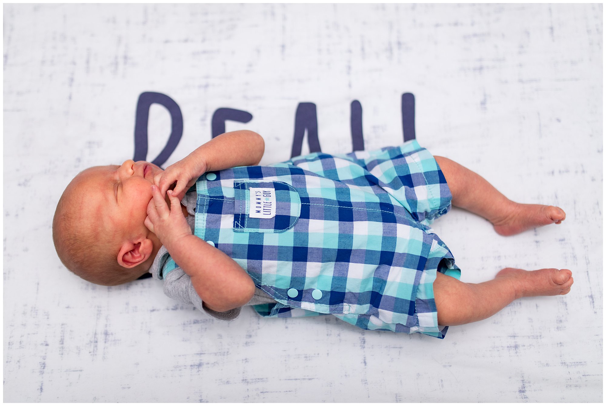 baby lies in crib during Muncie Indiana newborn session